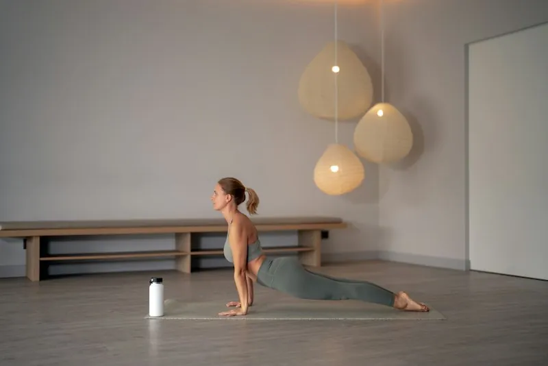 A woman holding a yoga pose